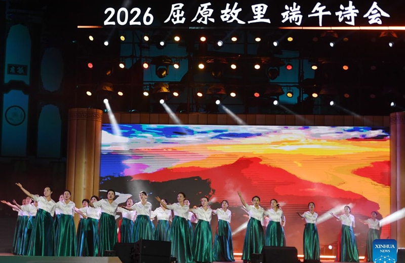 Actresses perform during a poetry gathering to celebrate the Dragon Boat Festival in front of the memorial temple of Qu Yuan, a renowned patriotic poet and minister of the State of Chu during the Warring States Period (475-221 BC), in Zigui County, central China's Hubei Province, June 19, 2026. (Xinhua/Ma Ning)