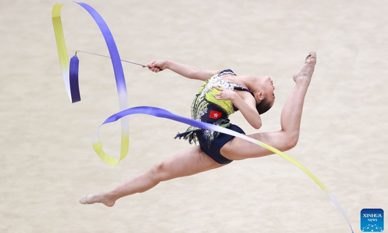 Lau Tsz Ching of China's Hongkong competes during the ribbon match of individual all-around final at the 2026 Rhythmic Gymnastics World Challenge Cup Beijing in Beijing, China, June 19, 2026. (Photo by Ma Zihan/Xinhua)