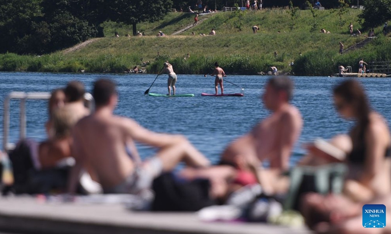 People boat on Danube river in Vienna, Austria, June 19, 2026. (Xinhua/He Canling)