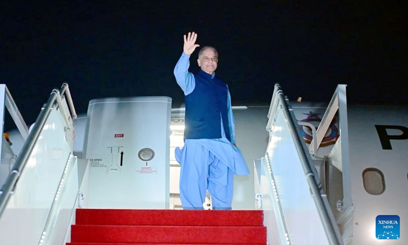 Pakistani Prime Minister Shehbaz Sharif waves as he boards a plane for Switzerland from Islamabad, Pakistan, June 21, 2026. Pakistani Prime Minister Shehbaz Sharif has left Islamabad for Switzerland to participate in technical-level talks as a follow-up to the recently signed U.S.-Iran Memorandum of Understanding (MoU), the Prime Minister's Office said early Sunday. (Prime Minister's Office of Pakistan/Handout via Xinhua)