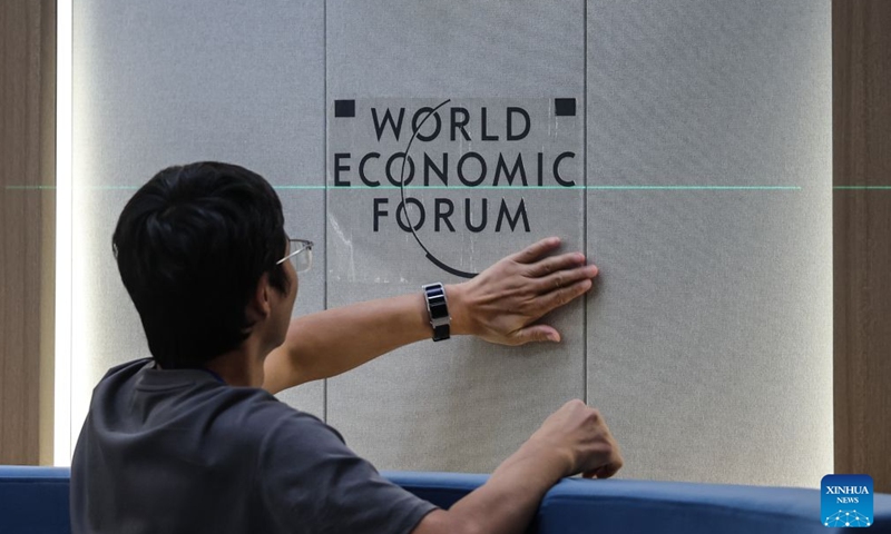 A staff member makes final preparations at the Dalian International Conference Center, venue of the 2026 Summer Davos, in Dalian, northeast China's Liaoning Province, June 20, 2026. The World Economic Forum's Annual Meeting of the New Champions, also known as the Summer Davos forum, will be held in the port city of Dalian from June 23 to 25. The Dalian International Conference Center, venue for the forum, has been decorated for the event. (Xinhua/Pan Yulong)