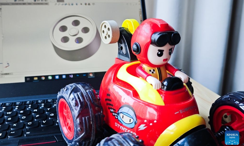 This photo taken on June 27, 2026 shows a children's toy repaired with 3D printing at a handicraft enthusiast's home in Beijing, capital of China. In recent years, consumer 3D printers have transformed from laboratory niche black technology to popular consumer products, covering different fields from home DIY and campus education to entrepreneurial innovation and large-scale production. (Xinhua/Guo Yu)

