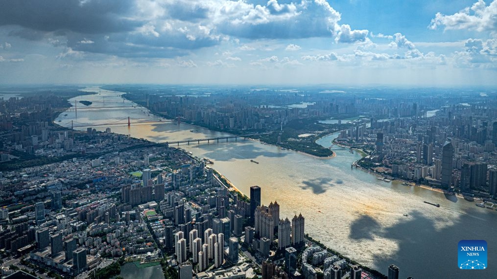 An aerial drone photo taken on July 29, 2025 shows vessels sailing on the Yangtze River in Wuhan, central China's Hubei Province. Hubei, dubbed the province of a thousand of lakes, has done a lot of work in the comprehensive management of its rivers and lakes, in an effort to improve its water ecology and water environment. (Xinhua/Xiao Yijiu)

