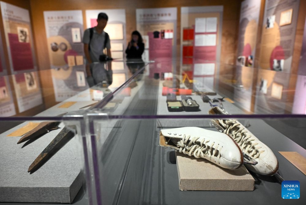 This photo taken on June 27, 2026 shows a pair of skates signed by Chinese-American figure skater Michelle Kwan during an exhibition in Beijing, capital of China. The exhibition highlighting friendly exchanges between the civilian sectors of China and the United States has opened at the Overseas Chinese History Museum of China in Beijing.

