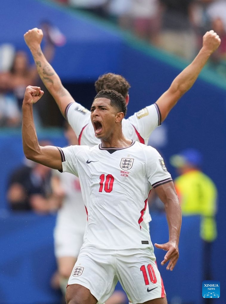 Jude Bellingham (front) of England celebrates after scoring during the quarter final match between Norway and England at the 2026 FIFA World Cup at the Miami Stadium in Miami, the United States, July 11, 2026. (Xinhua/Huang Zongzhi)

