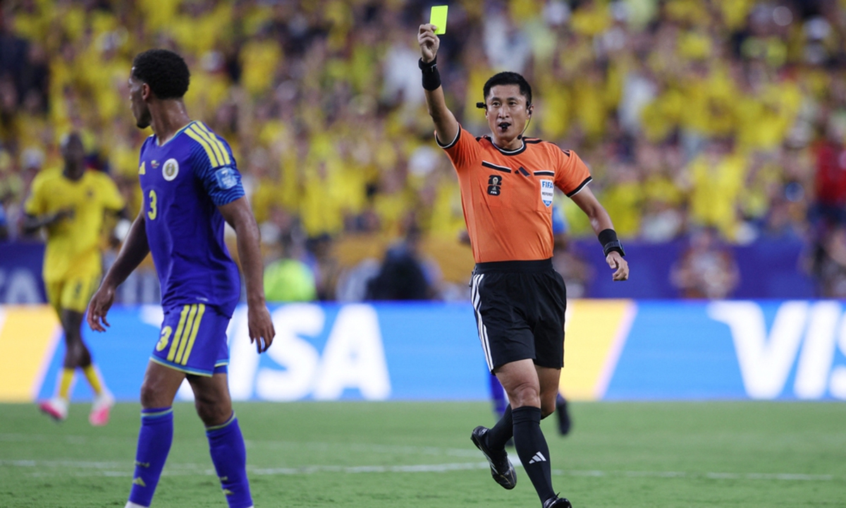 Chinese referee Ma Ning shows a yellow card to Curacao's player Jurien Gaari during the 2026 World Cup Group E football match between Ecuador and Curacao at the Kansas City Stadium in Kansas, the US, on June 20, 2026. Photo: IC