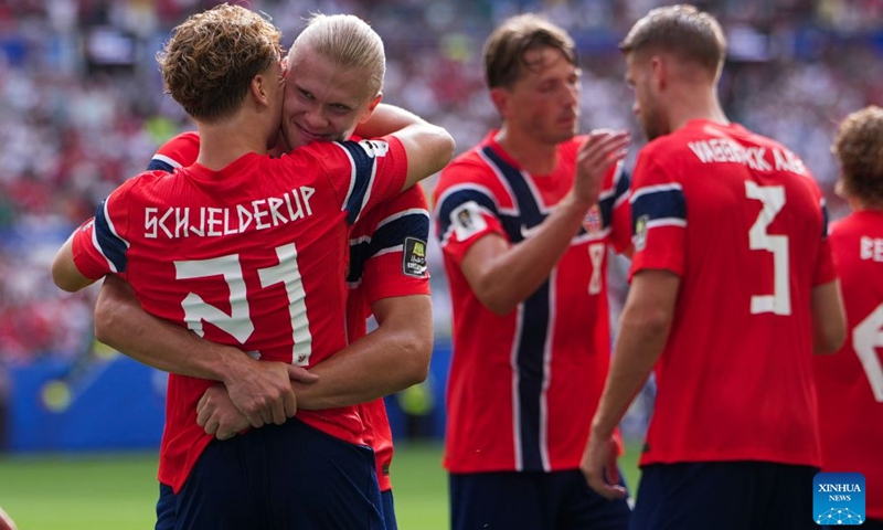 Andreas Schjelderup (1st L) of Norway celebrates after scoring with teammate Erling Haaland (2nd L) during the quarter final match between Norway and England at the 2026 FIFA World Cup at the Miami Stadium in Miami, the United States, July 11, 2026. (Xinhua/Huang Zongzhi)


