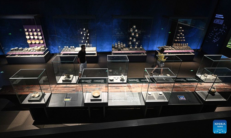 People visit an exhibition of archaeological discoveries from the shipwreck at Huaguang Reef, Xisha Islands, at the China (Hainan) Museum of The South China Sea in Qionghai, south China's Hainan Province, July 1, 2026.