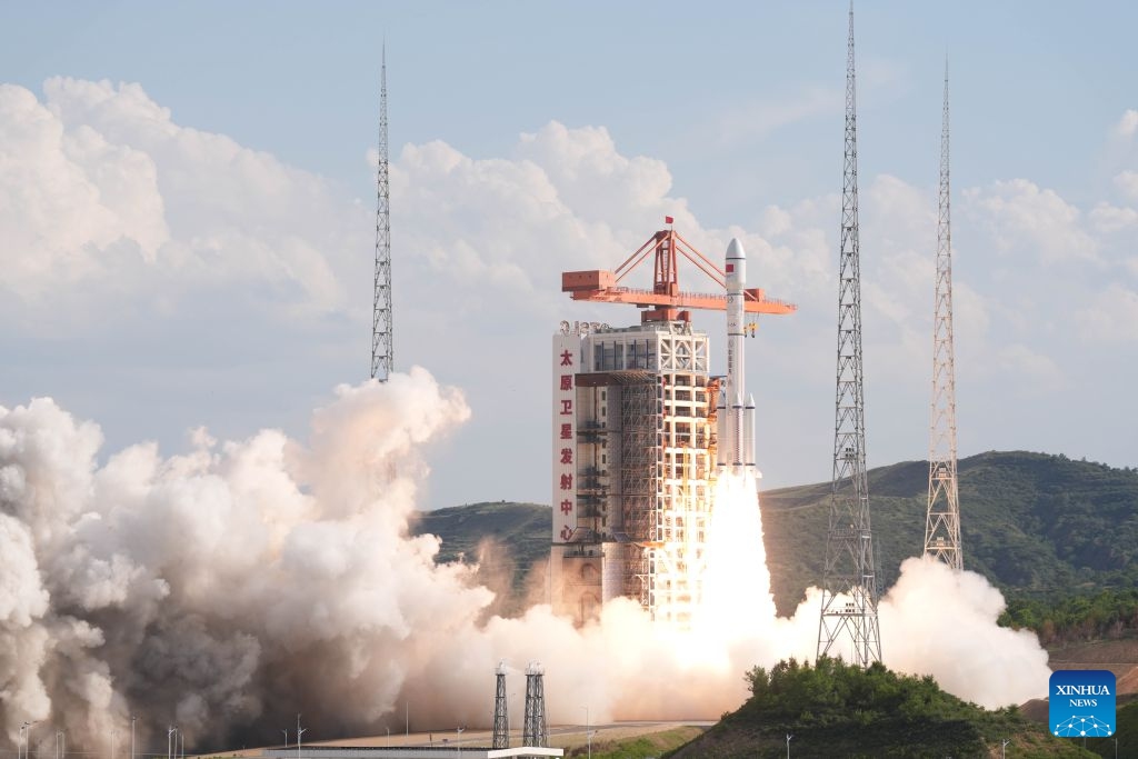 A modified Long March-6 carrier rocket carrying a new satellite group blasts off from the Taiyuan Satellite Launch Center in north China's Shanxi Province on July 4, 2026. The satellite group was launched at 5:30 p.m. (Beijing Time) aboard a modified Long March-6 carrier rocket and entered its preset orbit successfully. It will form part of the Spacesail Constellation, a mega commercial Chinese low-orbit satellite network. (Photo by Li Tiantian/Xinhua)
