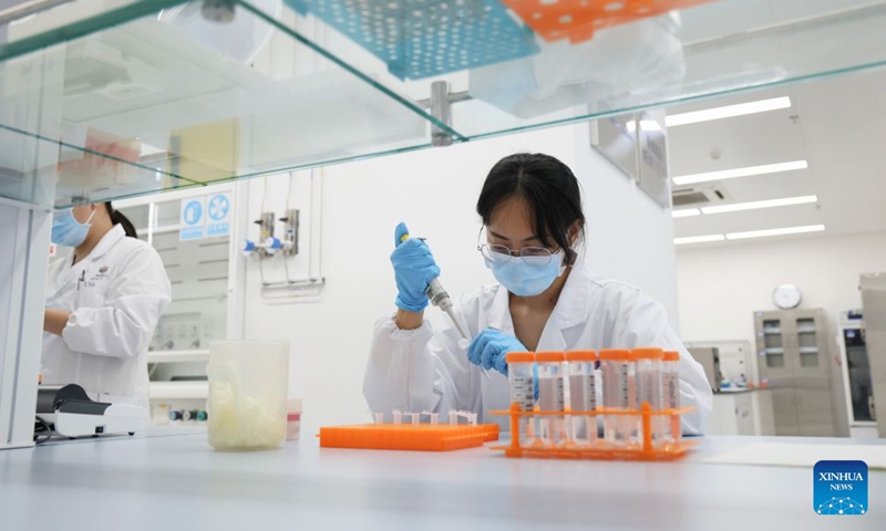 A researcher works at a laboratory of Research Institute of Tsinghua University in Shenzhen, in Shenzhen, south China's Guangdong Province, July 4, 2026. Research Institute of Tsinghua University in Shenzhen is an institution jointly established by Tsinghua University and Shenzhen Municipal Government in December 1996.
