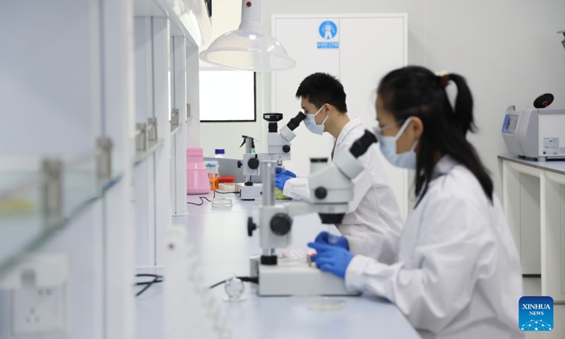 Researchers work at a laboratory of Research Institute of Tsinghua University in Shenzhen, in Shenzhen, south China's Guangdong Province, July 4, 2026. Research Institute of Tsinghua University in Shenzhen is an institution jointly established by Tsinghua University and Shenzhen Municipal Government in December 1996.
