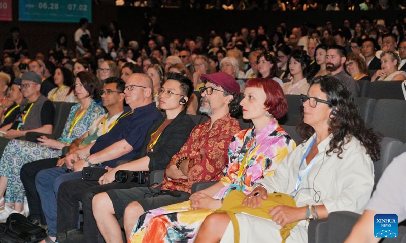 People attend the opening ceremony of the 2026 Congress of the International Academy of Ceramics in Jingdezhen, east China's Jiangxi Province, June 28, 2026. The 2026 Congress of the International Academy of Ceramics opened in the eastern Chinese city of Jingdezhen on Sunday, attracting international ceramic artists and experts to explore the theme of Inheritance and Innovation. (Xinhua)

