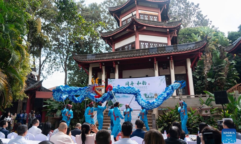 People watch a dragon dance performance at a dragon boat festival intangible cultural heritage fair in Nairobi, Kenya, June 20, 2026. (Xinhua/Xie Jianfei)