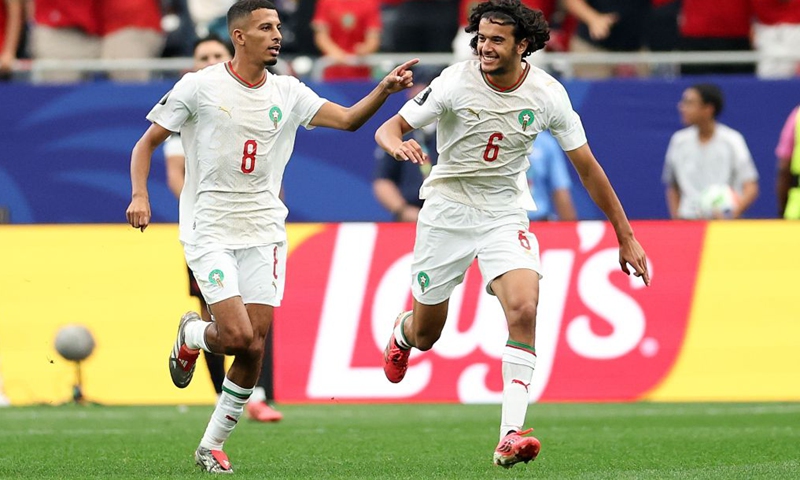 Azzedine Ounahi (L) of Morocco celebrates after scoring during the round of 16 match between Canada and Morocco at the 2026 FIFA World Cup at Houston Stadium in Houston, the United States, July 4, 2026. (Xinhua/Li Ming)

