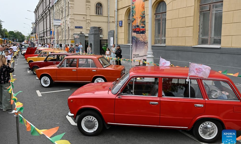 Retro cars are displayed during a vintage vehicle exhibition in Moscow, Russia, July 11, 2026. A retro tram parade and a vintage vehicle exhibition were held on Saturday to celebrate the Moscow Transport Day, which falls on the second Saturday of July each year. (Photo by Alexander Zemlianichenko Jr/Xinhua)
