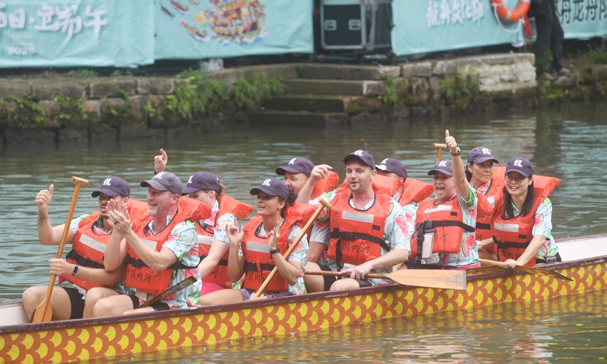 Foreign participants compete in the 2026 Xixi International Dragon Boat Race at the Xixi National Wetland Park in Hangzhou, East China's Zhejiang Province, on June 19, 2026, the Dragon Boat Festival. Photo: VCG