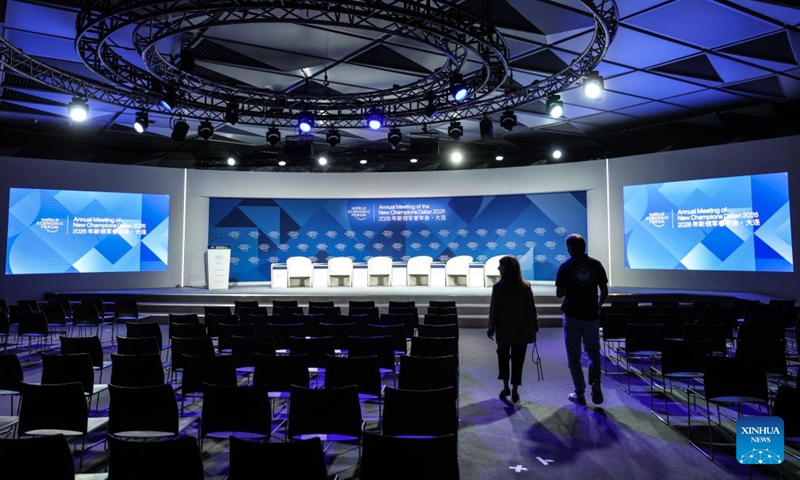 Staff members check a meeting room at the Dalian International Conference Center, venue of the 2026 Summer Davos, in Dalian, northeast China's Liaoning Province, June 20, 2026. The World Economic Forum's Annual Meeting of the New Champions, also known as the Summer Davos forum, will be held in the port city of Dalian from June 23 to 25. The Dalian International Conference Center, venue for the forum, has been decorated for the event. (Xinhua/Pan Yulong)