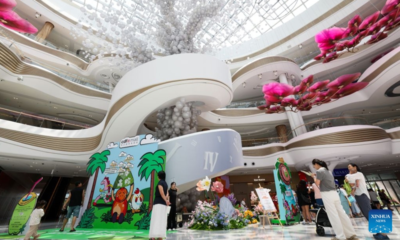 People shop at the Haikou International Duty Free Shopping Complex during the Dragon Boat Festival holiday in Haikou, south China's Hainan Province, June 20, 2026. (Xinhua/Yang Guanyu)