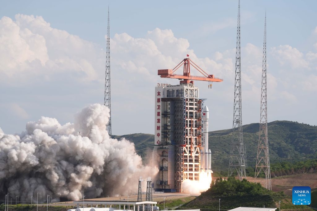 A modified Long March-6 carrier rocket carrying a new satellite group blasts off from the Taiyuan Satellite Launch Center in north China's Shanxi Province on July 4, 2026. The satellite group was launched at 5:30 p.m. (Beijing Time) aboard a modified Long March-6 carrier rocket and entered its preset orbit successfully. It will form part of the Spacesail Constellation, a mega commercial Chinese low-orbit satellite network. (Photo by Li Tiantian/Xinhua)