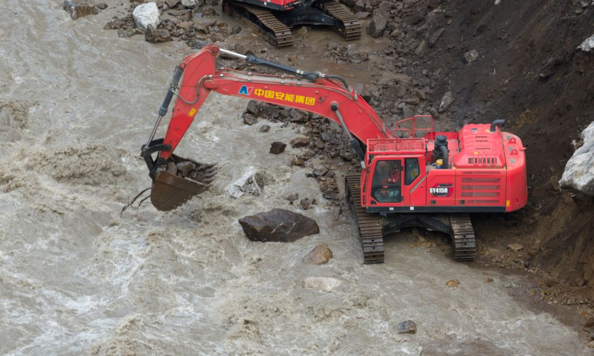 This aerial drone photo shows an excavator repairing a section of national highway G216 in Gyirong County, southwest China's Xizang Autonomous Region, on Aug. 31, 2026.

Rescuers with China Anneng are carrying out clearing and restoration operations on the damaged road sections, striving to restore the vital access route to Gyirong Port. (Xinhua/Jiang Fan)