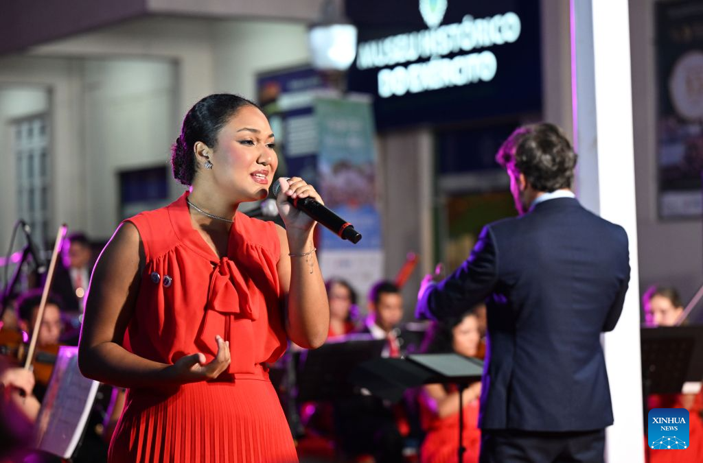 A Brazilian singer sings a Chinese song during a concert marking the 52nd anniversary of China-Brazil diplomatic relations at the Forte de Copacabana in Rio de Janeiro, Brazil, Aug. 16, 2026. The concert was held here on Sunday. (Xinhua/Jin Haoyuan)