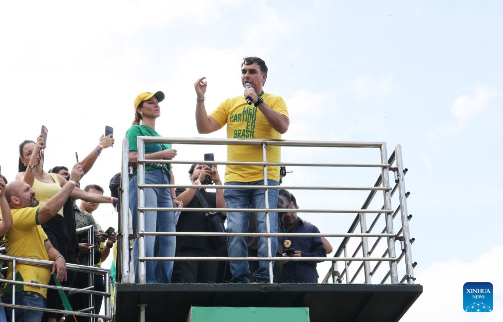 Brazilian Senator Flavio Bolsonaro (front R), presidential candidate of Brazil's Liberal Party, attends his first presidential campaign rally in Rio de Janeiro, Brazil, Aug. 16, 2026. (Xinhua/Jin Haoyuan)
