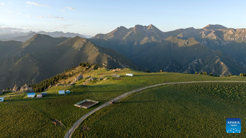 A drone photo taken on Aug. 6, 2026 shows a view of the Qilian Mountains in Sunan Yugur Autonomous County, Zhangye City, northwest China's Gansu Province. (Photo by Luo Jiawei/Xinhua)