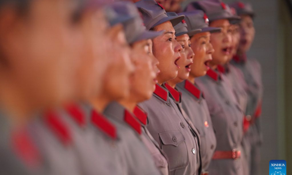 The Long March Origin choir perform at a middle school in Yudu County, east China's Jiangxi Province, Sept. 3, 2026. (Xinhua/Zhou Mi)
