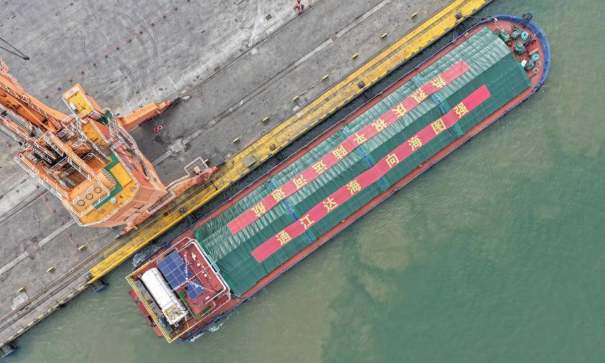 A cargo vessel prepares to depart for Nanning Port along the Pinglu Canal at the Qinzhou Port area of Beibu Gulf Port in Qinzhou, south China's Guangxi Zhuang Autonomous Region, Sept. 16, 2026. (Xinhua/Zhang Ailin)