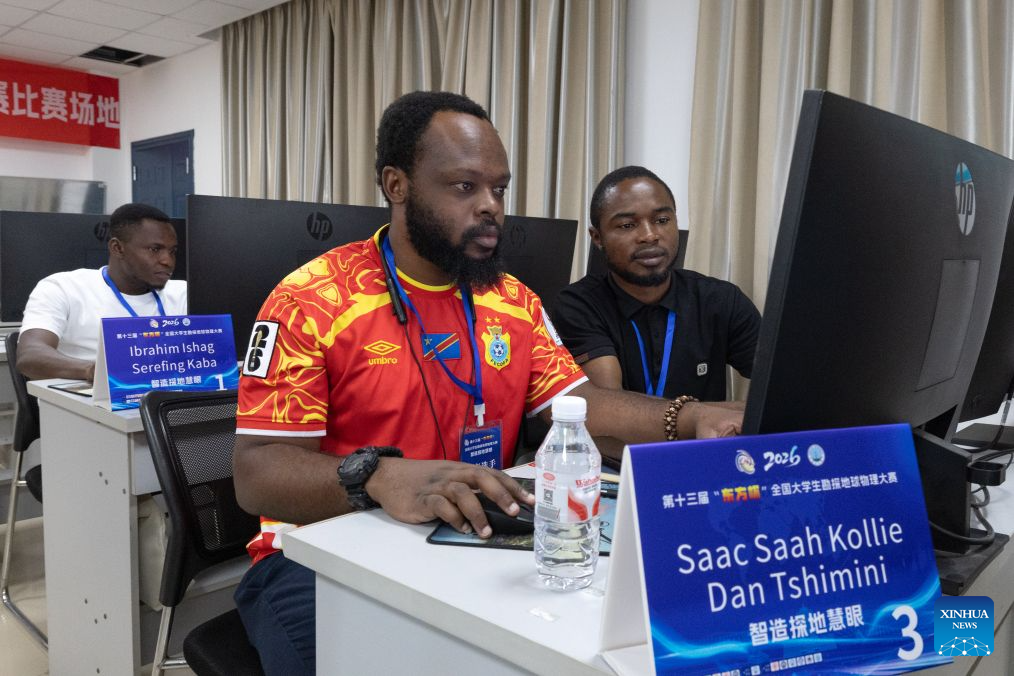 Contestants take part in the National Exploration Geophysics Competition for College Students at Yangtze University in Jingzhou City, central China's Hubei Province, Aug. 26, 2026. The competition kicked off here on Wednesday, with 148 teams from 32 colleges competing in software development and application. (Xinhua/Xiao Yijiu)