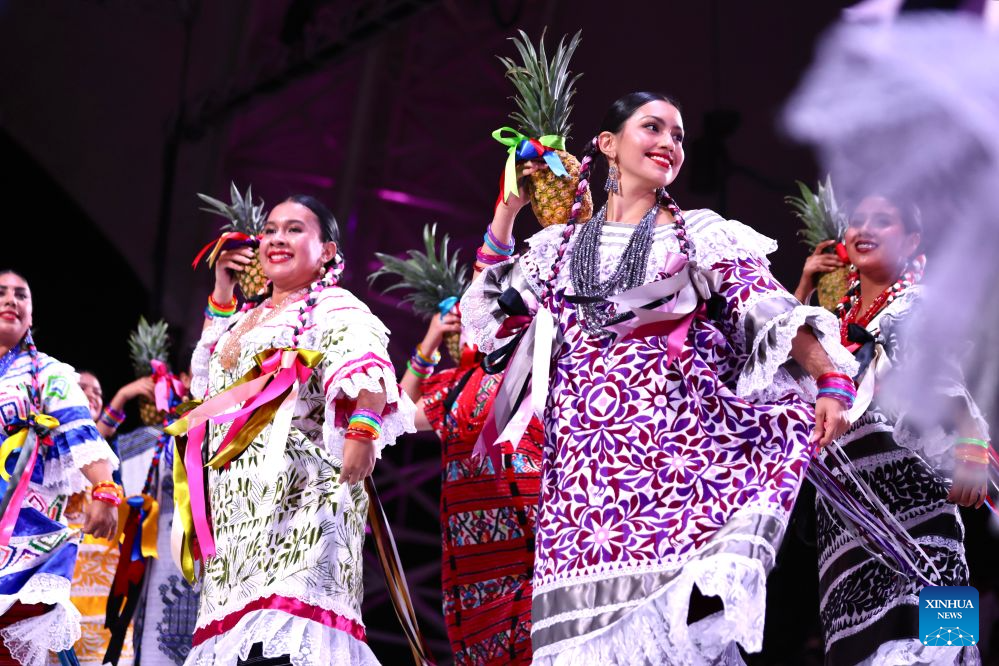 Performers dance at the Guelaguetza Auditorium in Oaxaca City, Mexico, July 27, 2026. Guelaguetza is an annual showcase of the indigenous cultures of Mexico, featured by traditional music, dance, and food.

The most important celebration of Guelaguetza happens on the last two Mondays of July every year at the Guelaguetza Auditorium on Fortin Hill, thus it's also called Mondays on the Hill. (Xinhua/Liu Wenhui)
