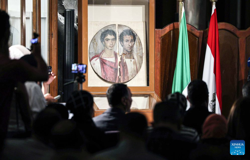 Photo taken on Oct. 11, 2026 shows the Tondo of the Two Brothers, an ancient Egyptian portrait from the Roman period, which will be displayed at Rome's Ara Pacis Museum, at a press conference in Cairo, Egypt. Egypt has restored the Tondo of the Two Brothers, an ancient Egyptian portrait from the Roman period that will be displayed outside the country for the first time, Egyptian Minister of Tourism and Antiquities Sherif Fathy announced Sunday. Fathy made the announcement at a press conference at the Egyptian Museum in Tahrir, Cairo, where the restored masterpiece was unveiled. It will be displayed at Rome's Ara Pacis Museum as part of the exhibition The Power of the Portrait: Egypt and Rome, Faces of Fayum, running from Nov. 5, 2026, to May 2, 2027. (Xinhua/Ahmed Gomaa)