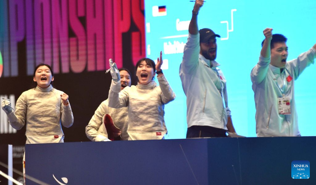 Fencers and coaches of China celebrate during the team women's sabre round of 16 match between China and Bulgaria at the 2026 Fencing World Championships in Hong Kong, south China, July 29, 2026. (Xinhua/Lo Ping Fai)