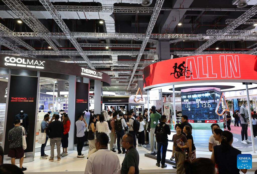 Visitors are seen during Intertextile Shanghai Apparel Fabrics - Autumn Edition in east China's Shanghai, Aug. 25, 2026. The trade fair kicked off here on Tuesday. (Xinhua/Fang Zhe)