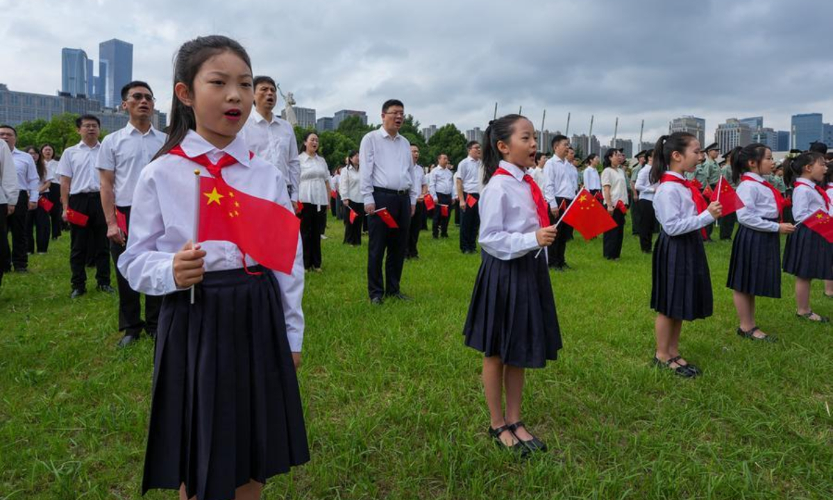 People attend a ceremony marking the 81st anniversary of the victory of the Chinese People's War of Resistance against Japanese Aggression and the World Anti-Fascist War at the Memorial Hall of the Victims in Nanjing Massacre by Japanese Invaders, in Nanjing, east China's Jiangsu Province, Sept. 3, 2026. (Xinhua/Li Bo)