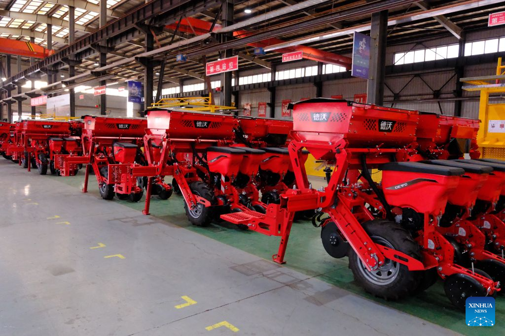 This photo taken on Sept. 1, 2026 shows electric-drive precision seeders at a workshop of Heilongjiang Dewo Technology Development Co., Ltd. in Harbin, northeast China's Heilongjiang Province. (Xinhua/Ji Hang)