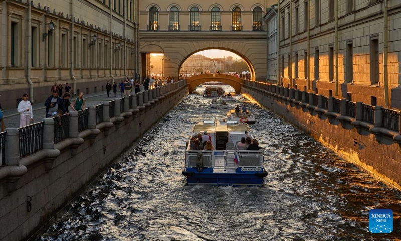 Tourists take sightseeing boats on the Winter Canal in St. Petersburg, Russia, June 21, 2026.

St. Petersburg's White Nights is a spectacular summer phenomenon where the city's high northern latitude prevents the sky from getting completely dark. (Photo by Guo Feizhou/Xinhua)