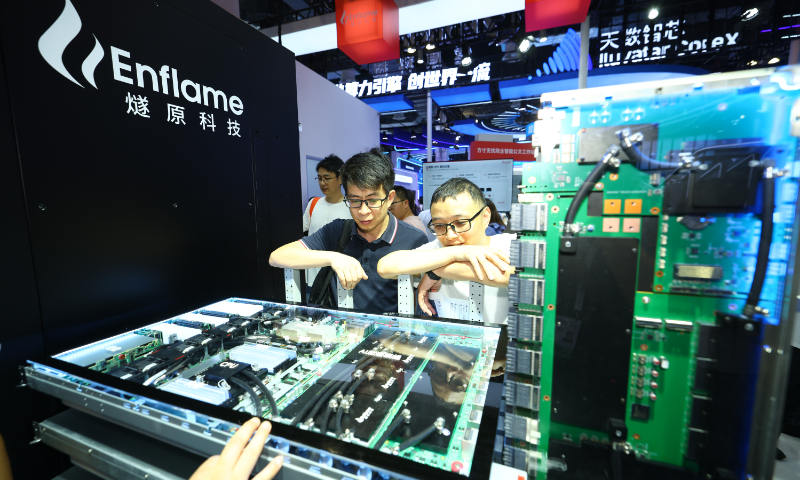 Visitors look at chip products of Enflame Technology at the 2026 World AI Conference in Shanghai on July 18, 2026. Photo: VCG
