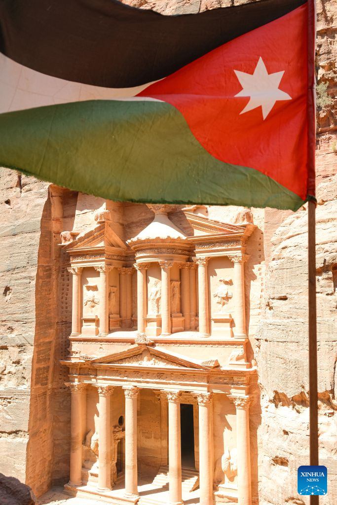 This photo taken on July 23, 2026 shows a scene at the Treasury in the ancient city of Petra, Jordan. Jiayuguan, the westernmost point of China's Ming Dynasty Great Wall, and the ancient city of Petra in Jordan are both landmarks boasting rich cultural heritage.
In 2017, they established a twinhood relationship, built on the fact that both are UNESCO-listed World Heritage sites, distinguished by their unique and creative architecture in harmony with the natural environment.
In 2025, the Chinese city of Jiayuguan and the Jordanian city of Petra signed an agreement on cooperation in culture and tourism at the archaeological site of Petra, seeking to strengthen the friendly ties between the two historical sites. (Xinhua/Xin Mengchen)