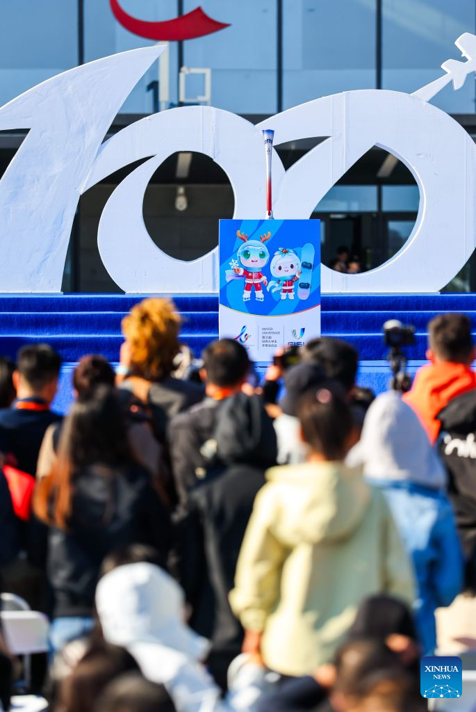 The torch is unveiled at the 100-day countdown event for the Changchun 2027 Winter Universiade in Changchun, northeast China's Jilin Province, Oct. 7, 2026. The medals, torch, uniforms and equipment for the Changchun 2027 Winter Universiade were unveiled on Wednesday at a 100-day countdown event held at the Changchun International Aviation Expo City. (Xinhua/Xu Chang)