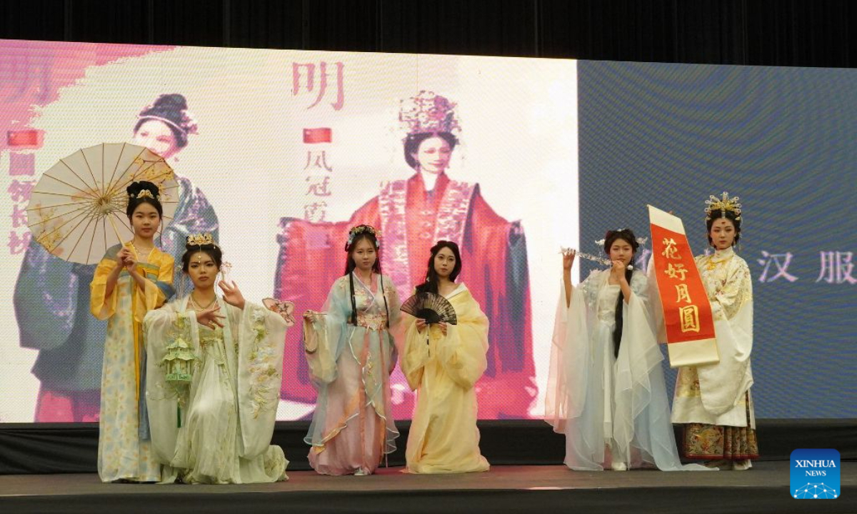 Performers show Hanfu at a gathering celebrating the Chinese traditional Mid-Autumn Festival in Gaborone, Botswana, Sept. 20, 2026. The Chinese community in Botswana gathered on Sunday at the Gaborone International Convention Center in the capital of Botswana, celebrating the Chinese traditional Mid-Autumn Festival, which falls on Sept. 25 this year. (Xinhua/Guo Chunju)