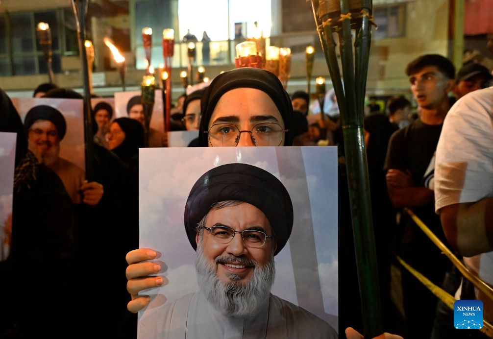 People take part in a ceremony to mark the second anniversary of the death of late Hezbollah leader Hassan Nasrallah in Beirut's southern suburbs, Lebanon, on Sept. 26, 2026. Hassan Nasrallah was killed in an Israeli airstrike on Sept. 27, 2024. (Xinhua/Bilal Jawich)