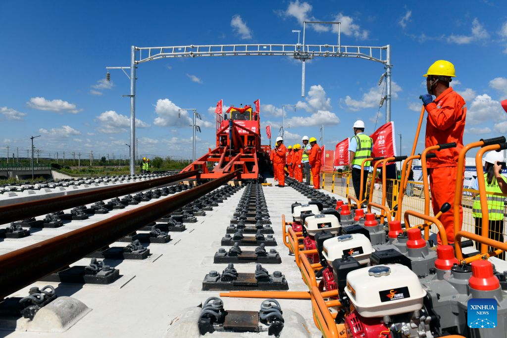 Staff members from China Railway 21st Bureau Group Corporation Limited carry out a continuous welded rail installation task for the Tianjin-Weifang High-Speed Railway at the Dongying South Railway Station in Dongying City, east China's Shandong Province, Sept. 1, 2026. The construction of the Tianjin-Weifang High-Speed Railway entered the track-laying phase on Tuesday, with continuous welded rail installation tasks starting respectively from Dongying South Railway Station and Binzhou Railway Station on the day.

Connecting Binhai Station in north China's Tianjin Municipality and Weifang North Station in east China's Shandong Province with a total length of approximately 349 kilometers and a designed speed of 350 kilometers per hour, the Tianjin-Weifang High-Speed Railway belongs to a greater high-speed rail artery network consisting eight vertical lines and eight horizontal lines in the country. (Xinhua/Guo Xulei)