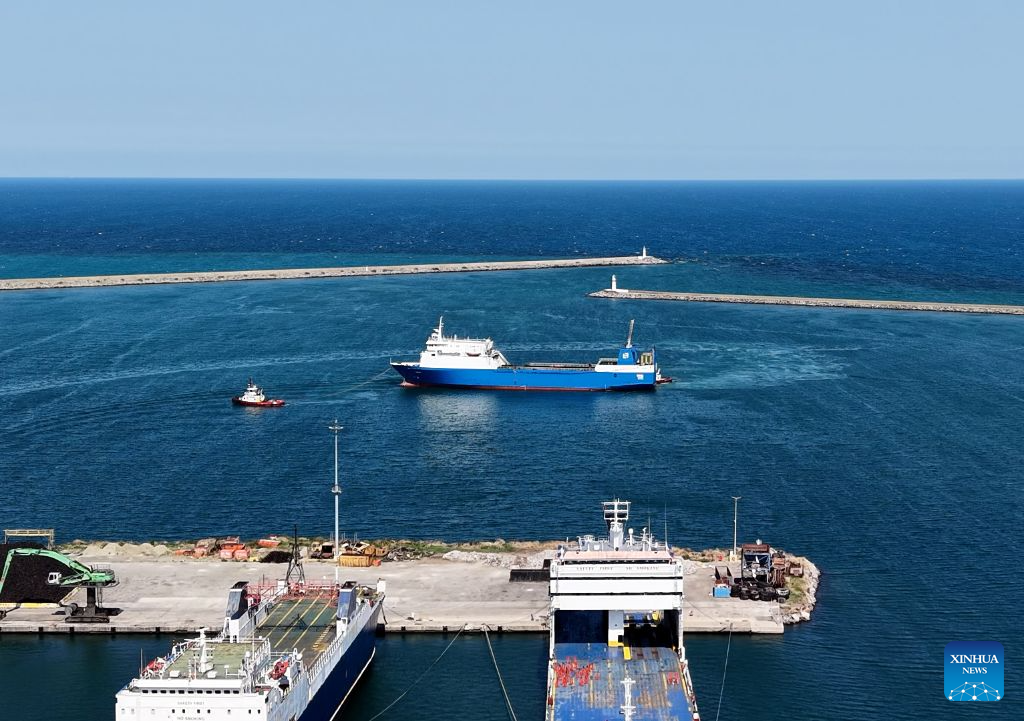 A drone photo taken on Aug. 23, 2026 shows the ship, named Ural and owned by Kalyoncu Denizcilik, at the port of Samsun, Türkiye. The ship, which was attacked around midnight off Russia's Black Sea port of Novorossiysk, has arrived at the Port of Samsun on Saturday. One sailor was killed and eight others were injured after it came under attack. (Mustafa Kaya/Handout via Xinhua)