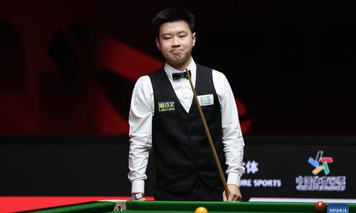 Zhao Xintong reacts during the round 2 match between Scott Donaldson of Scotland and Zhao Xintong of China at World Snooker Tour Shenzhen Open 2026 in Shenzhen, south China's Guangdong Province, Sept. 28, 2026. (Xinhua/Liang Xu)