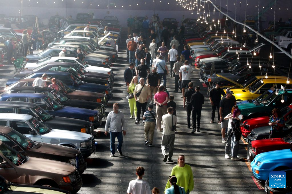 People visit a vintage car show in Minsk, Belarus, Aug. 29, 2026. (Photo by Henadz Zhinkov/Xinhua)