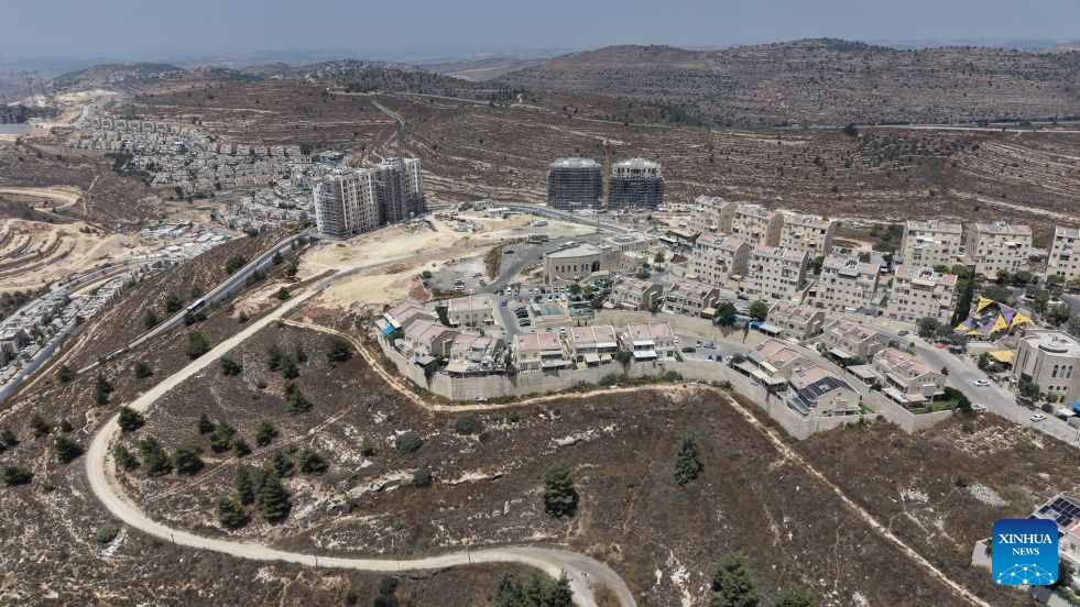 This photo taken on Aug. 9, 2026 shows an Israeli settlement under construction in the West Bank, near Jerusalem. In recent years, Israel's continued approval of settlement expansions in the region has drawn widespread criticism from the international community. (Photo by Gil Cohen Magen/Xinhua)