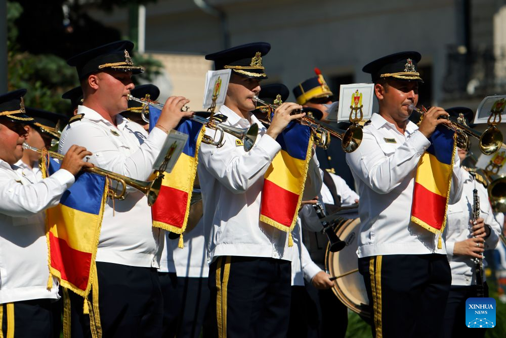 A military band performs during ceremonies marking the National Anthem Day in Bucharest, Romania, July 29, 2026. (Photo by Cristian Cristel/Xinhua)