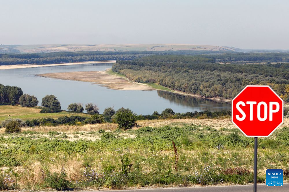 This photo taken on Aug. 5, 2026 shows the exposed riverbed of the Danube River in Rasova, southeastern Romania. Severe drought has triggered record-low water level of the Danube river. (Photo by Cristian Cristel/Xinhua)