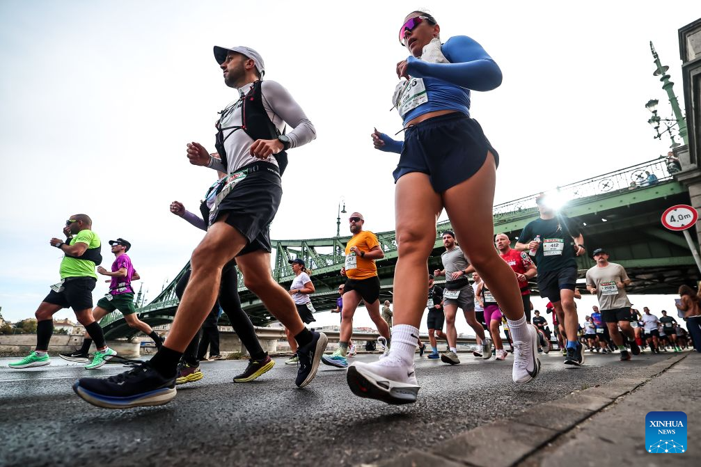 Runners compete during the 41st SPAR Budapest Marathon in Budapest, Hungary, Oct. 11, 2026. (Photo by David Balogh/Xinhua)